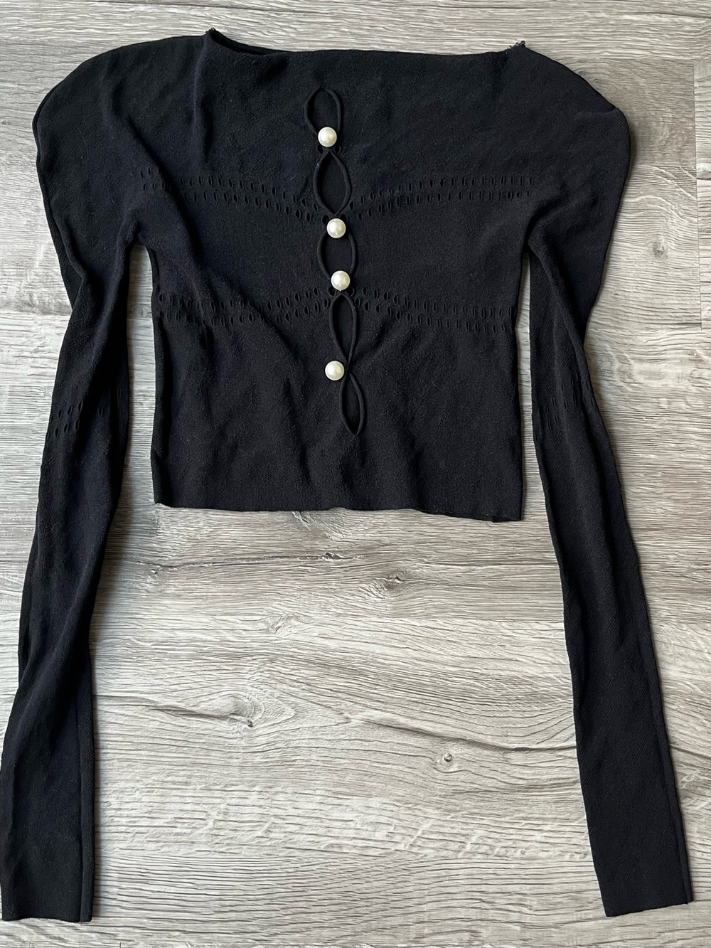 Black Long-Sleeve Stretchy Crop Top with Pearl Button Detail